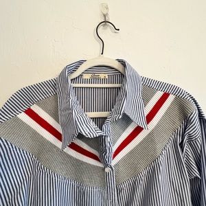 Blue and white striped shirt with red and white details.US size 12.